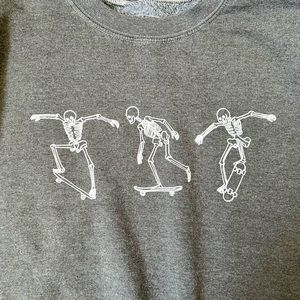 Gray skating skeletons sweater